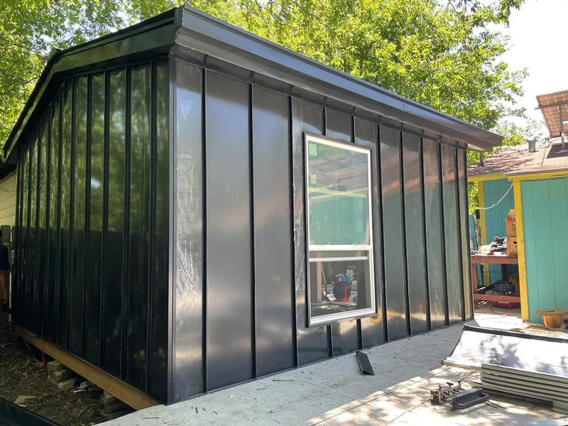 Black standing seam metal wall panels for Metal Roof Installation in Coral Hills