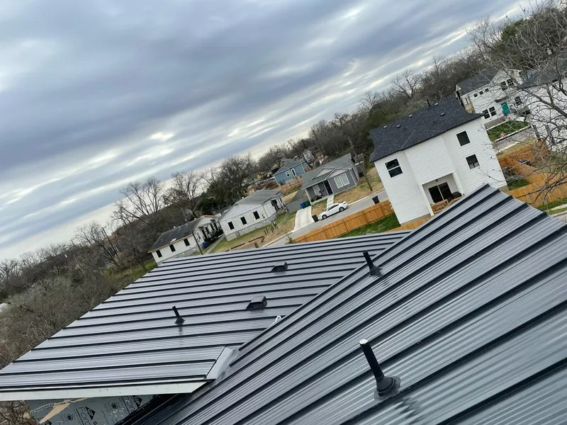 Standing seam metal roof panels with vents for Skylight Repair in Coral Hills